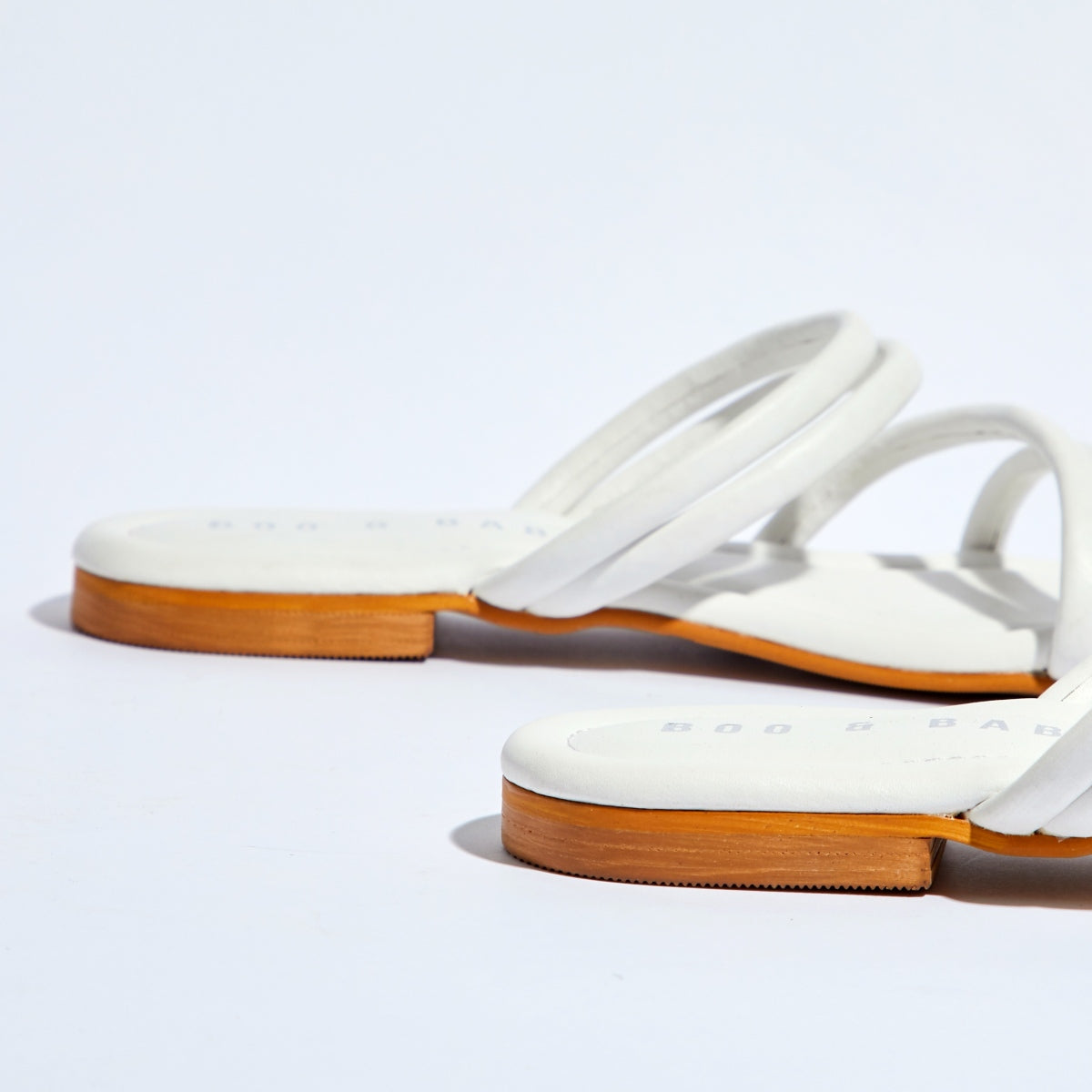 Minimal Strappy Slip-on Flats by Boo & Babe