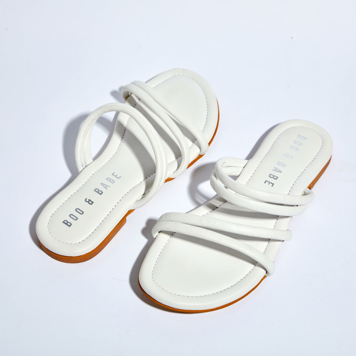 Minimal Strappy White Slip-on Flats by Boo & Babe